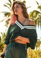 THE UPSIDE Bonita Knit Crew in Dark Green is a long sleeve ‘V’ neck knit crew with contrast stripe detail and rib neck, cuffs and hem.