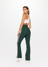 THE UPSIDE St Germain Florence Flare in Dark Green is a recycled high waisted V front full length flare with side splits and white binds down side seams.