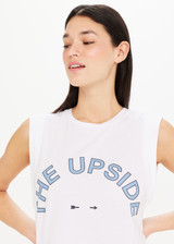 THE UPSIDE Cropped Muscle Tank is a sustainable organic cotton relaxed fit, sleeveless cropped muscle tank with our printed horseshoe logo at chest.