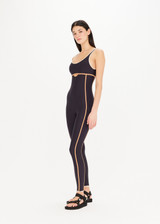 THE UPSIDE Northstar Rhiannon Catsuit in Black is a sustainable scoop neck and low pack catsuit framed in contrast binds with a mini cut out at front underbust and removable cups.