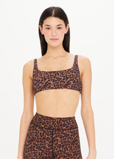 THE UPSIDE Biarritz Rory Bra in Leopard print is a recycled mid coverage bra with straight back straps, a scooped square neck, and removable cups.