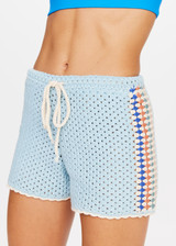 THE UPSIDE Castillo Crochet Hali Short in Mist Blue is a pure cotton crochet short with elastic waist, knitted drawcord, contrast stripe detail down sides and cream edge stitching around hem.