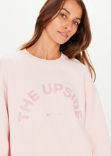 THE UPSIDE Saturn Crew in Rosewater Pink is a sustainable organic cotton relaxed and oversized crew with a soft rib cuff and neckline and embroidered with our