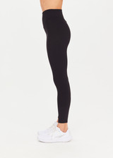 THE UPSIDE Ribbed 25inch High Midi Pant in Black is a recycled 25” midi length legging with a “V” shaped high-rise waistband and embroidered with our arrow logo at back.
