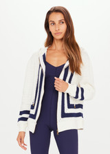 THE UPSIDE Kai Crochet Hoodie in Natural is an oversized long line crochet hoodie with contrast navy stripes and a soft plaited drawcord.