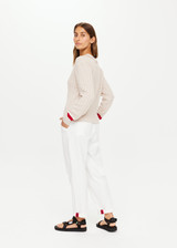 THE UPSIDE Trophy Sonny Knit Sweater in Malt is a sustainable organic cotton classic V neck knit with knitted stripes at sleeve hem and neckline.
