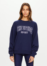 THE UPSIDE Ivy League Saturn Crew in Navy is a sustainable organic cotton relaxed and oversized crew with soft rib neck cuffs and waist and embroidered with our Ivy League THE UPSIDE Sport logo at chest.