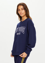 THE UPSIDE Ivy League Saturn Crew in Navy is a sustainable organic cotton relaxed and oversized crew with soft rib neck cuffs and waist and embroidered with our Ivy League THE UPSIDE Sport logo at chest.