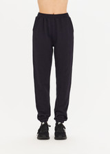 THE UPSIDE women's black Blake Track Pant is a classic, mid rise jogger made from organic cotton french terry. It features elasticated cuffs, an elasticated drawstring waist, side seam pockets and back patch pockets.