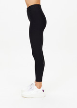 THE UPSIDE women's black Matte Tech 25inch Midi Pant is a mid rise, 7/8 length, matte tech performance legging is made from breathable, quick drying and moisture wicking fabric.