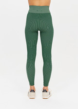 THE UPSIDE womens two-toned green pine/matcha Rib Seamless 25 Inch Midi Pant made with Ribbed Seamless fabric features soft support, reverse ribbed side panels and moisture control properties.