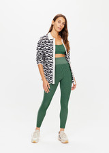 THE UPSIDE womens two-toned green pine/matcha Rib Seamless 25 Inch Midi Pant made with Ribbed Seamless fabric features soft support, reverse ribbed side panels and moisture control properties.