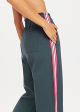 THE UPSIDE womens cool dark blue high waisted wide leg Niseko Monte Pant made with Lenzing viscose soft suiting fabric features elastic waistband, stripe down side seams and side and back pockets.