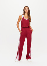 THE UPSIDE women’s merlot-red low-rise Freedom Juliet Pant made with slinky fabrication features contrasting binds, split hem detail, elasticated waist and side seam pockets.