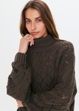 THE UPSIDE womens relaxed fit khaki Suki Clementine Knit Crew made with 100% organic cotton features a diamond-knit chunky knit construction with rib hem, cuffs and neckline; a cosy classic.