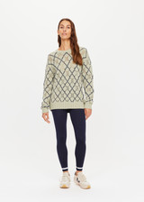 THE UPSIDE womens matcha green Jardin Boo Knit made with brushed organic cotton is a crew neck knit featuring a diamond check design with contrasting navy thread and soft knitted cuff, neck and hem.