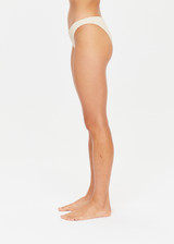 THE UPSIDE golden Sands Moss Pant is a classic, medium coverage pant in luxe cream textured fabrication with gold lurex thread and is fully lined.