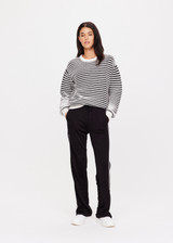THE UPSIDE women's black Celeste Pant is a relaxed fit, mid rise trackpant with a slinky fabrication. It features a straight leg silhouette, elasticated waistband and drawcord, knitted striped tape down side seams and pockets at the front and back. THE UPSIDE women's black Celeste Pant is a relaxed fit, mid rise trackpant with a slinky fabrication. It features a straight leg silhouette, elasticated waistband and drawcord, knitted striped tape down side seams and pockets at the front and back.