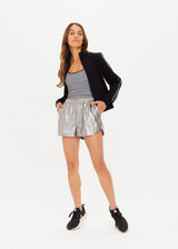 THE UPSIDE women's black slim-fit Realm Margot Jacket made with soft suiting lenzing viscose fabrication features a front zip, functional welt pockets at front, cream piping details, and rib neck, hem and cuffs.