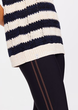 THE UPSIDE women's black and cream stripe Queens Nelson Knit Vest made with organic combed cotton knit fabric features soft rib cuff, neck and hem and an oversized fit.