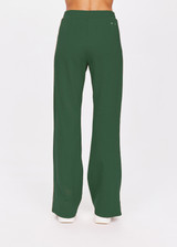 THE UPSIDE women's pine green Petra Flare is a flared pant with splits at front, contrast knitted cream tape down side seams cream tape down the side seams, pockets and elastic at waist.