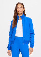 THE UPSIDE women's blue Bahia Margot Jacket made in soft lenzing viscose fabric is designed for a slim fit. This zip front jacket features welt pockets, a ribbed neckline, hem and cuffs.