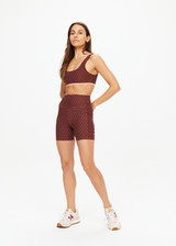 THE UPSIDE women's polka dot Maho 5 inch Pocket Spin Short is made from a soft recycled ribbed fabric and features a high-rise v waistband and discreet side pockets.