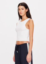 THE UPSIDE women's white Reign Tank is made with organic ribbed cotton rib, designed for a true to size fit. This high neck staple tank features a scooped T back.
