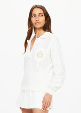 THE UPSIDE women's white Baccarat Violette Sweater is made in organic cotton knit on front and soft cotton jersey on back, sleeves and collar. This is a relaxed vintage inspired sweater.