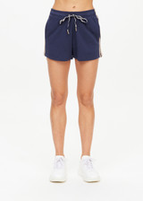 THE UPSIDE women's navy Cascade Zippy Short is made with organic french terry cotton, designed for a relaxed fit. This classic gym short features an elastic drawcord waist.
