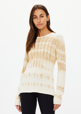 THE UPSIDE women's beige hand tie dyed Amana Long Sleeve Knit Top is made from organic cotton. This lightweight, long sleeve knitted top is designed for everyday wear and recovery.