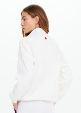 THE UPSIDE women's white Pacific Morgan Zip Jacket is made from organic cotton. The tennis jacket features pockets and drawstring. Designed for tennis and pickleball.