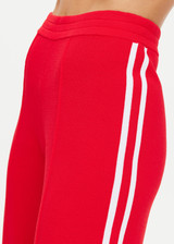 THE UPSIDE women's red Montana Freya Knit Pant is made from viscose blend. The straight pants features elastic waist and side stripe. Designed for lifestyle wear.