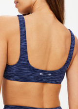 THE UPSIDE women's blue Mystere Reversible Rory Bra is made from recycled fabric. The sports bra features a reversible design. Designed for yoga, pilates and barre.