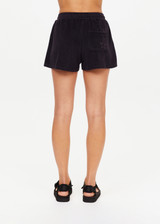 THE UPSIDE women's black Saddle Up Ziggy Short is made from hemp and cotton blend. The gym short features elastic waist and pockets. Designed for comfort.