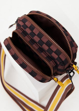 THE UPSIDE women's recycled fabric black and chocolate check Technica Voyage Crossbody Bag features multiple pockets with zippers, plus an adjustable and removable stripe strap.