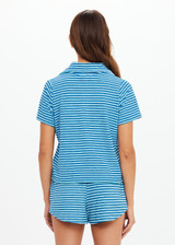 THE UPSIDE women's blue stripe Rio Lilou Polo top features a soft stretch terry fabrication with cropped polo shape and button front. The perfect vacation piece.