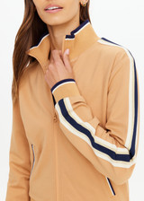 THE UPSIDE women's yellow Le Sport Margot Zip Jacket is designed for a slim fit and features pockets and textured knit side tapes. Perfect for travel and everyday.