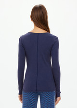 THE UPSIDE women's navy organic cotton Ness Ribbed Long Sleeve Top is designed for a slim fit. The perfect piece for layering and styling up or down.