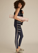 THE UPSIDE women's navy recycled peached Daytona Jetta Racerback Sports Bra is designed for a supportive fit and features removable cups. Made for yoga & pilates.