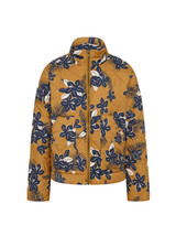 THE UPSIDE women's floral Aruba Quilted Nicola Jacket is designed for an oversized fit and features patch pockets and antique brass zipper. Made for lifestyle.
