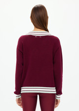 THE UPSIDE women's merlot organic cotton Josette V Neck Knit Sweater is a regular fit and features striped neckline in mint and white. Made for lifestyle.