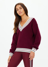 THE UPSIDE women's merlot organic cotton Josette V Neck Knit Sweater is a regular fit and features striped neckline in mint and white. Made for lifestyle.
