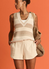 THE UPSIDE women's creme organic cotton Hamilton Dee Short is designed for a regular fit, featuring a elasticated waistband with side seam pockets. Made for everyday.