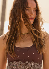 THE UPSIDE women's paisley recycled peached Mikkola Lou Scoop Crop is designed for a supportive fit and features internal shelf bra with removable cups. Made for yoga, pilates, barre.