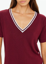 THE UPSIDE women's merlot Sienna V Neck Tee is a retro style slim fit track tee in a lightweight knit and features a deep V neckline. Made for everyday.