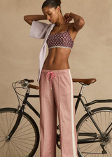 THE UPSIDE women's floral Firefly Hutton Scoop Bra is mid coverage with scoop front, adjustable straps, removable bust cups and shelf bra. Made for pilates.