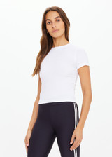 THE UPSIDE women's white Shelter Fitted Tee is made from soft modal rib fabrication and features a embroidered arrow logo at back of neck. Made for everyday wear.