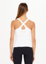 THE UPSIDE women's white Balance Seamless Lenny Tank is form fitting with a scoop neckline, cross back straps and an internal shelf bra for extra support. Made for yoga & pilates.