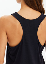 THE UPSIDE women's black Dri Release Markova Tank is a sleeveless longline tank made from our fast-drying, dri release performance fabric and features a printed arrow logo on back.